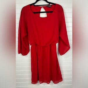 Express women’s red long sleeved mini dress with keyhole back. Size medium